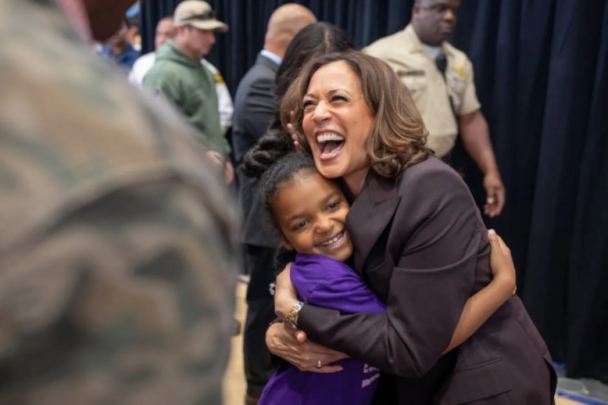 Vice President Harris embraces a young supporter